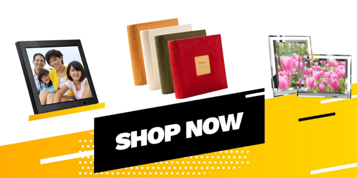 Collection of photo albums and frames with a 'Shop Now' button on a white background
